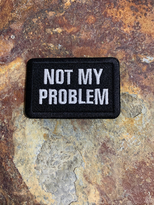 Not My Problem - Embroidered - VELPATCH 3" x 2" inch Hook Backed Patch