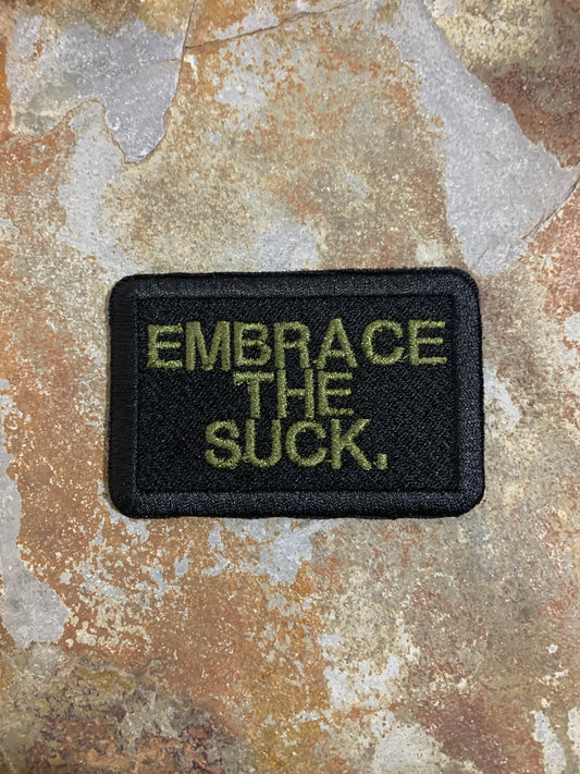 Embrace The Suck - Embroidered - VELPATCH 3" x 2" inch Hook Backed Patch
